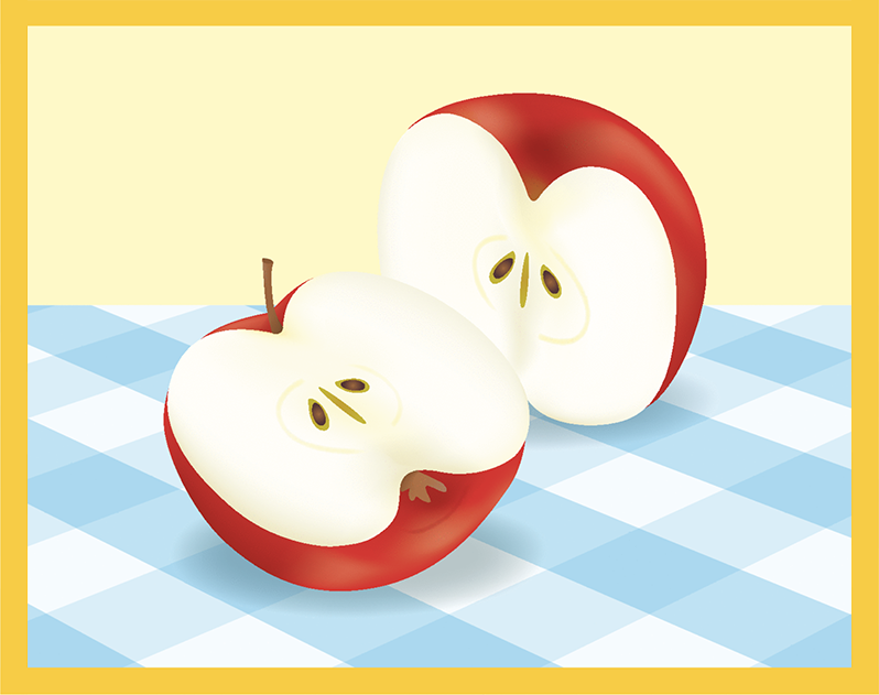 One red apple cut in half. Each half has 2 seeds.